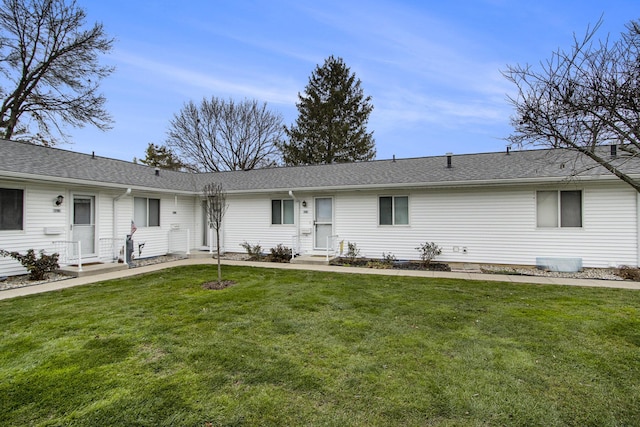 ranch-style home featuring a front lawn