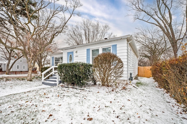 view of front of property with fence