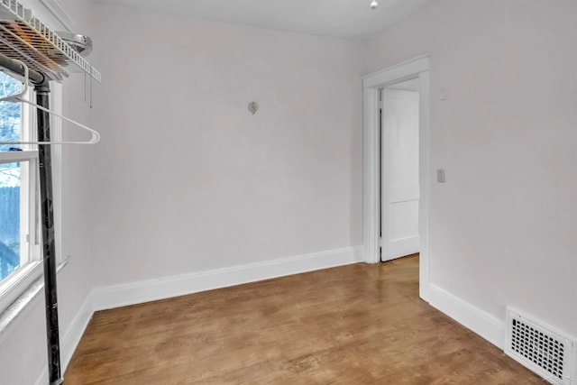 unfurnished room featuring light hardwood / wood-style flooring