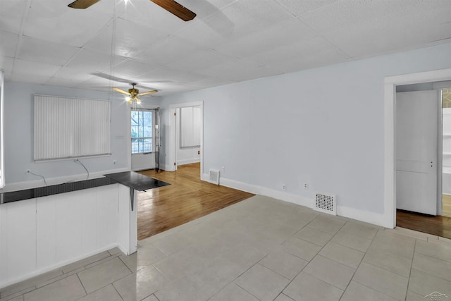 unfurnished living room featuring light hardwood / wood-style flooring