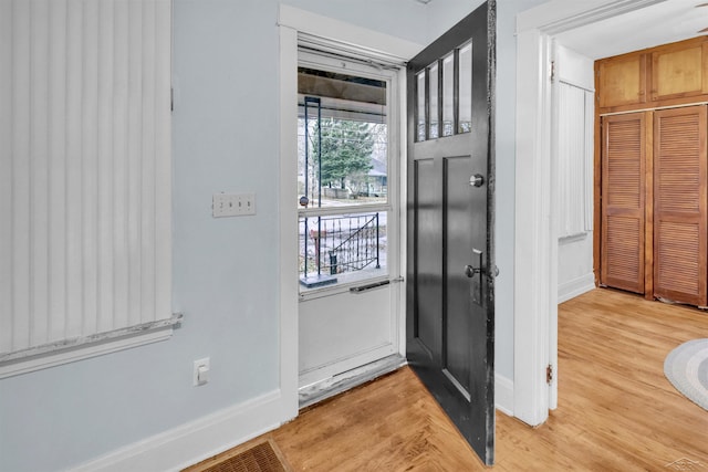 entryway with light wood-type flooring