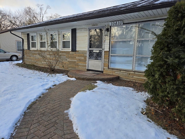 view of front of house featuring stone siding