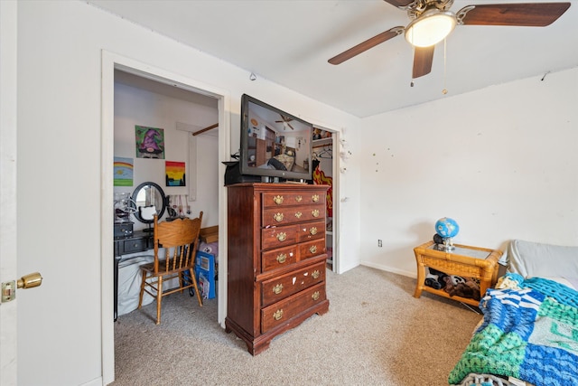 bedroom featuring ceiling fan and light colored carpet