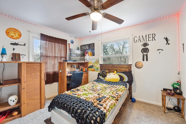 bedroom featuring ceiling fan and carpet floors