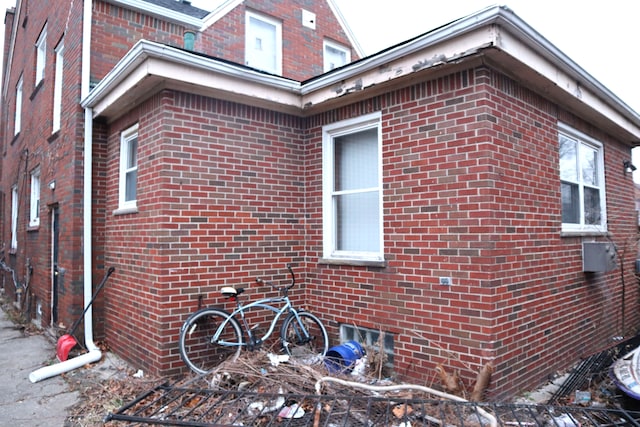 view of home's exterior featuring brick siding