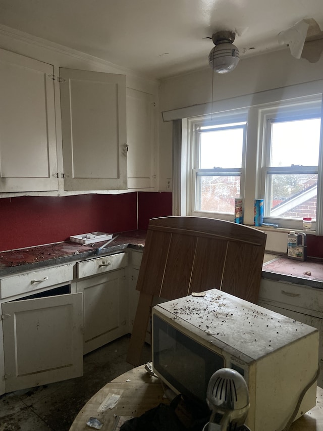 kitchen with white cabinetry