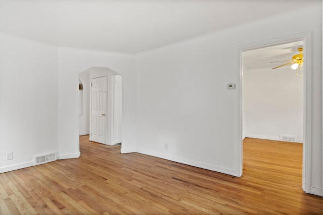 spare room with ceiling fan and light hardwood / wood-style flooring