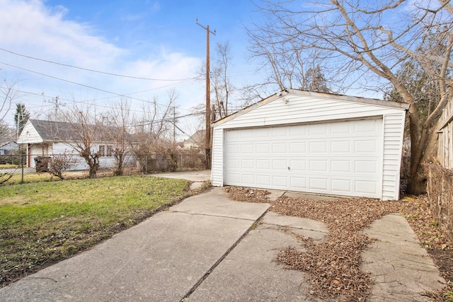 garage featuring a lawn