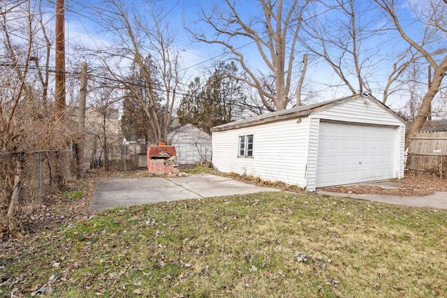 garage with a yard