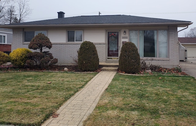 view of front of home with a front yard