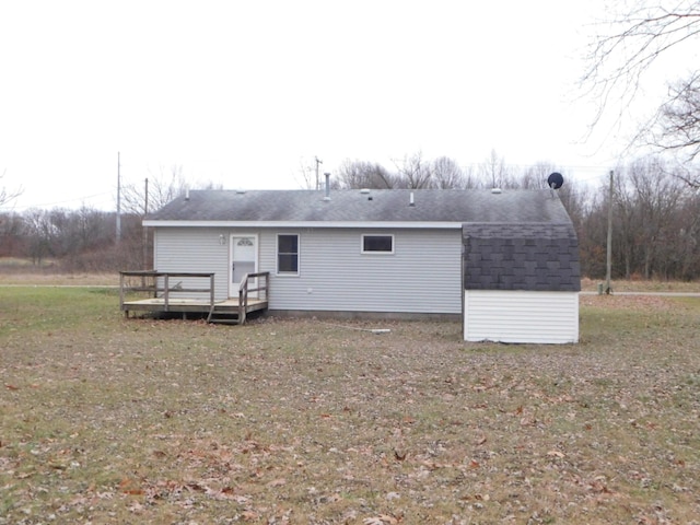 rear view of property with a deck