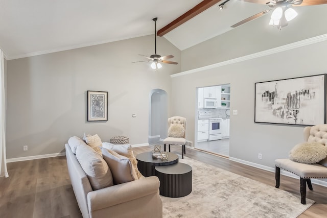 living room with wood-type flooring and lofted ceiling with beams