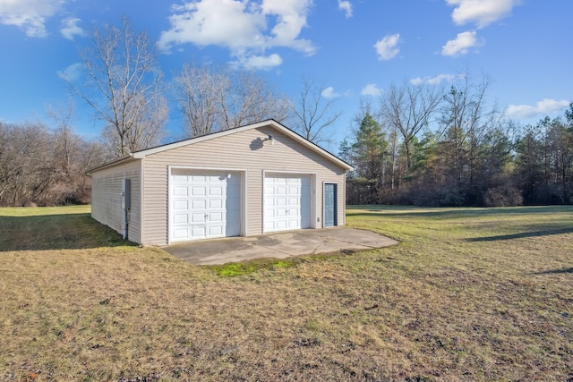 garage with a lawn