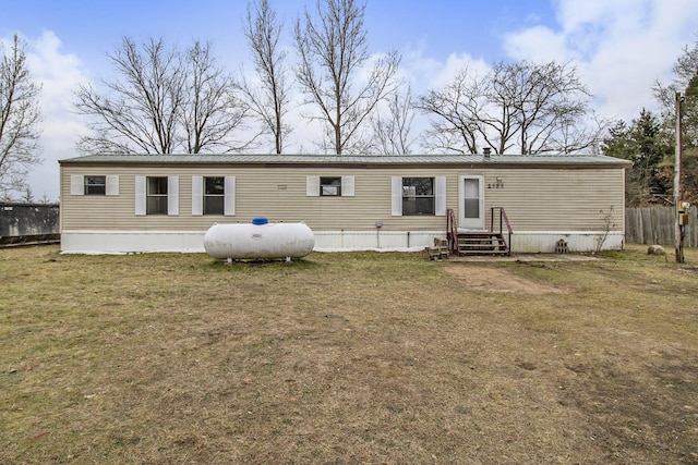 view of front of home with a front lawn