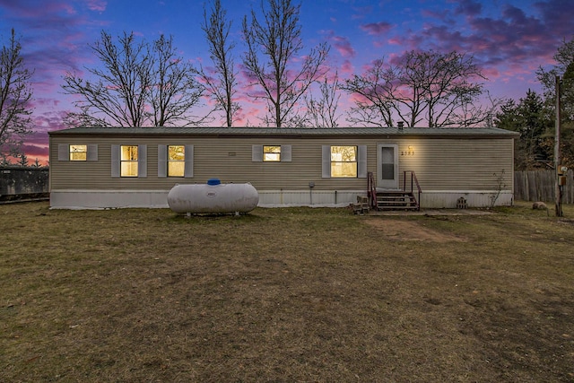 manufactured / mobile home with a yard