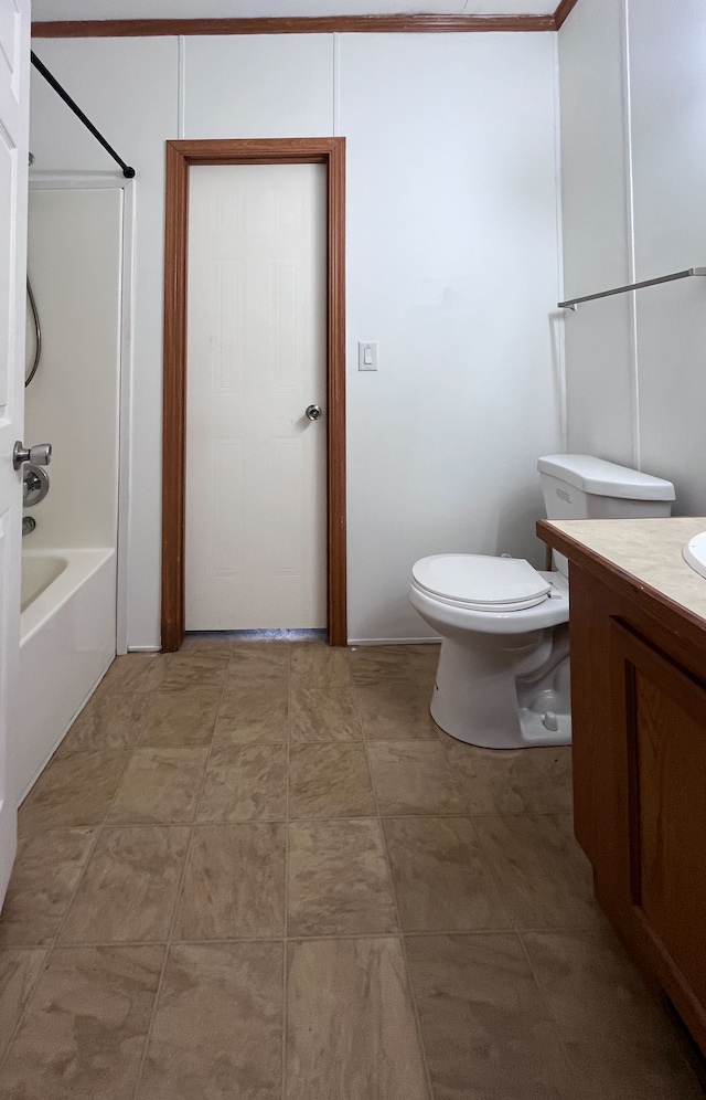 full bathroom featuring vanity, bathtub / shower combination, and toilet