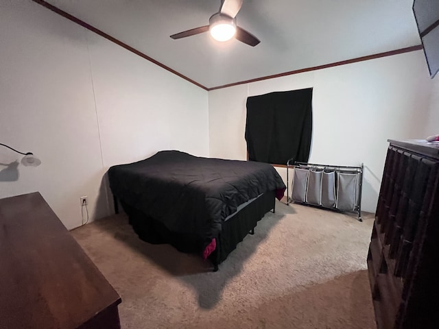 bedroom featuring lofted ceiling, light colored carpet, ceiling fan, and crown molding