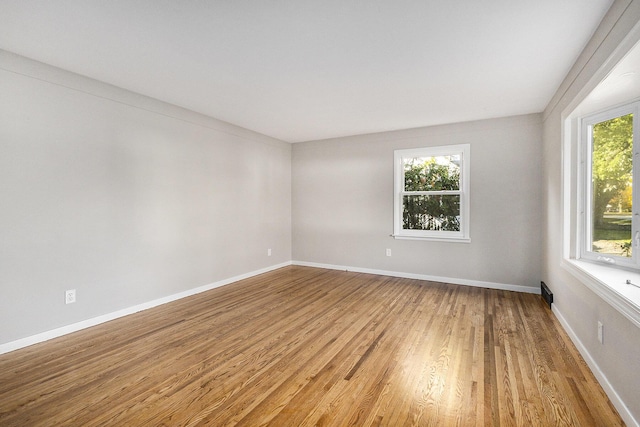 empty room featuring hardwood / wood-style floors