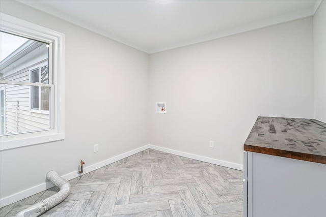 laundry room featuring hookup for a gas dryer, hookup for a washing machine, and light parquet floors