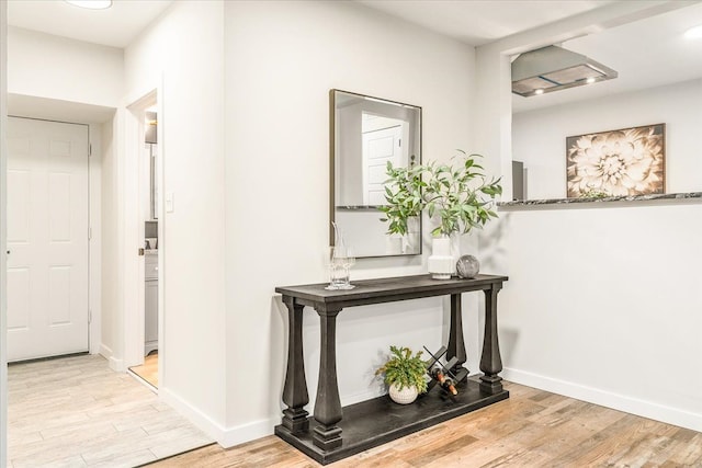 corridor featuring light hardwood / wood-style flooring