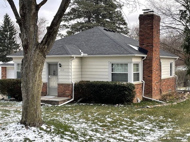 view of front of house with a lawn