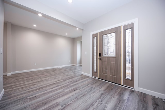 foyer entrance with light wood-type flooring