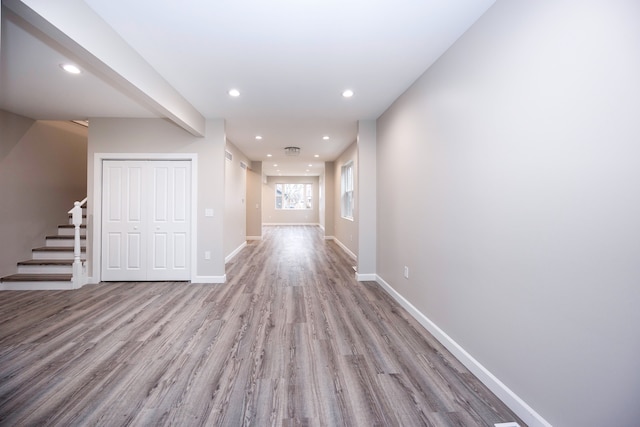 hall with light wood-type flooring