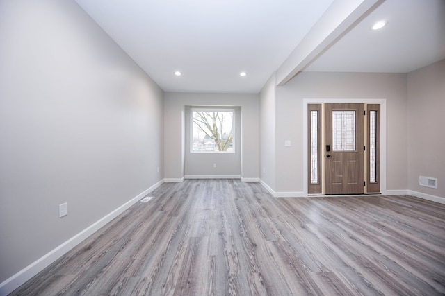 foyer entrance featuring light wood-type flooring