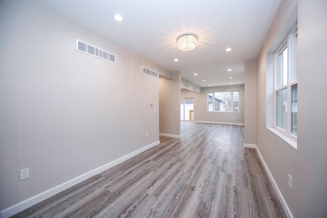 spare room featuring light wood-type flooring