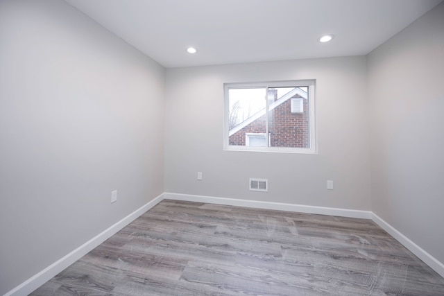 unfurnished room featuring light wood-type flooring