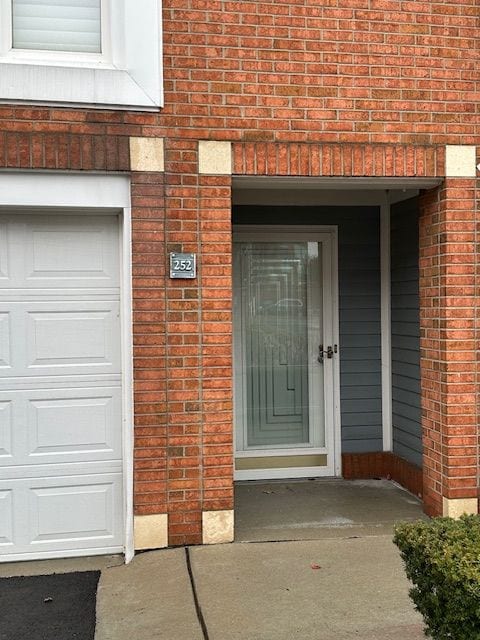 entrance to property with a garage