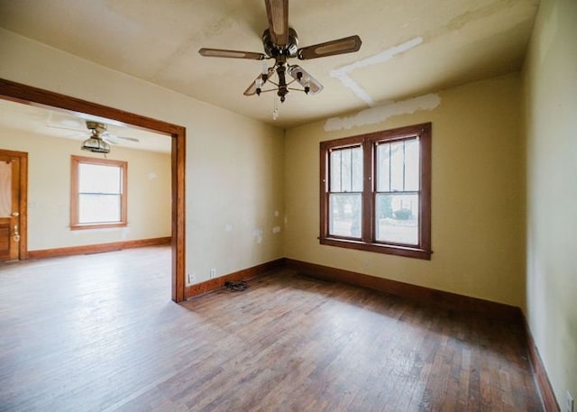 unfurnished room featuring ceiling fan and hardwood / wood-style flooring