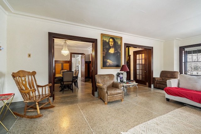 living room featuring crown molding