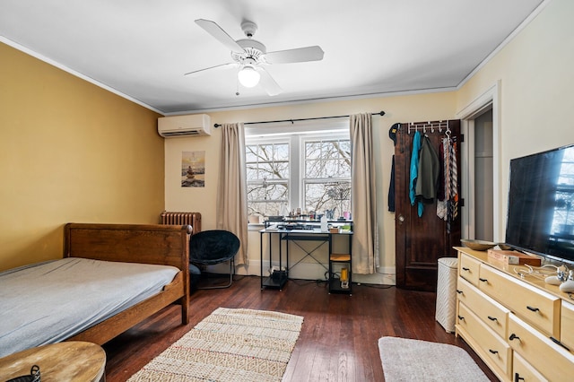 bedroom with dark hardwood / wood-style flooring, a wall unit AC, ceiling fan, and ornamental molding