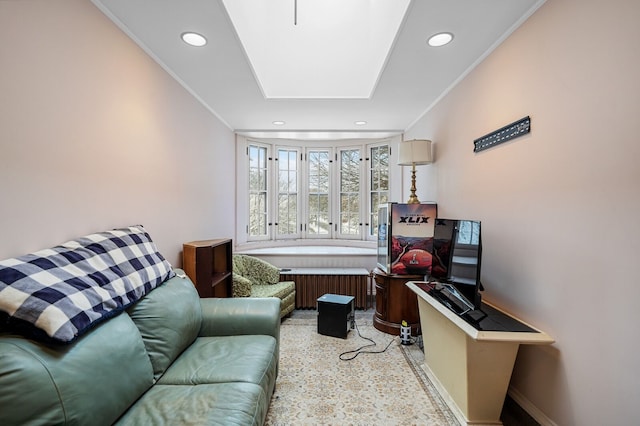 living room featuring crown molding