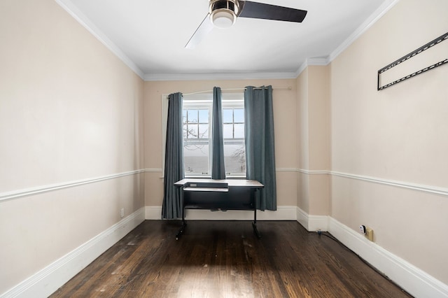 empty room with ceiling fan, dark hardwood / wood-style flooring, and ornamental molding