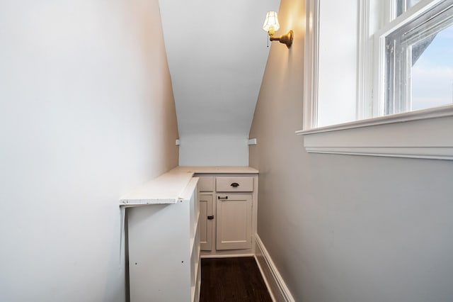 stairway featuring hardwood / wood-style floors