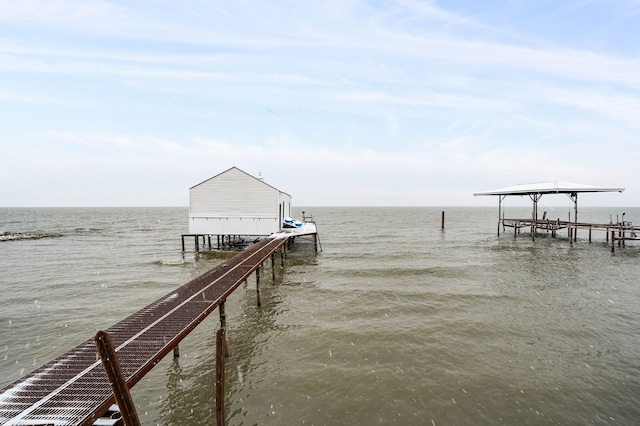 view of dock with a water view