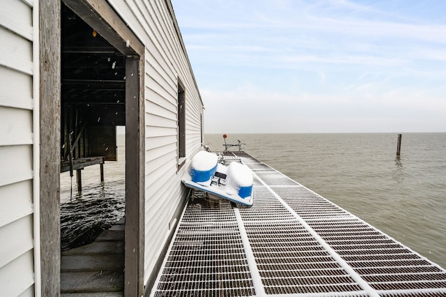 dock area featuring a water view