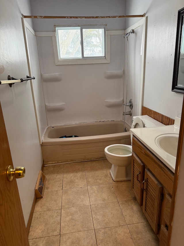 full bathroom featuring tile patterned flooring, bathtub / shower combination, vanity, and toilet