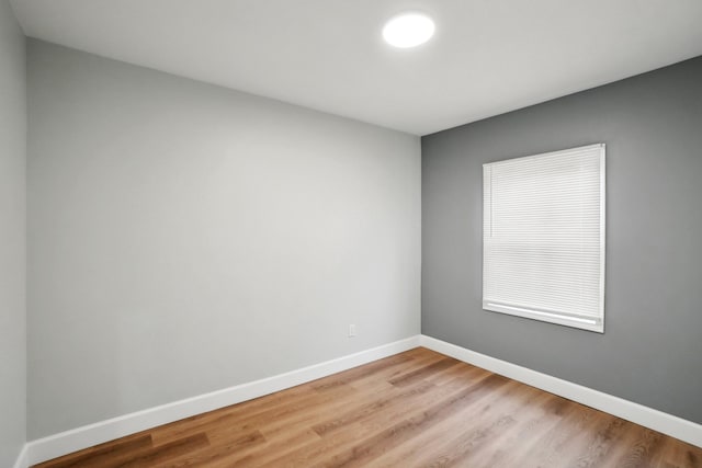 empty room with light wood-type flooring