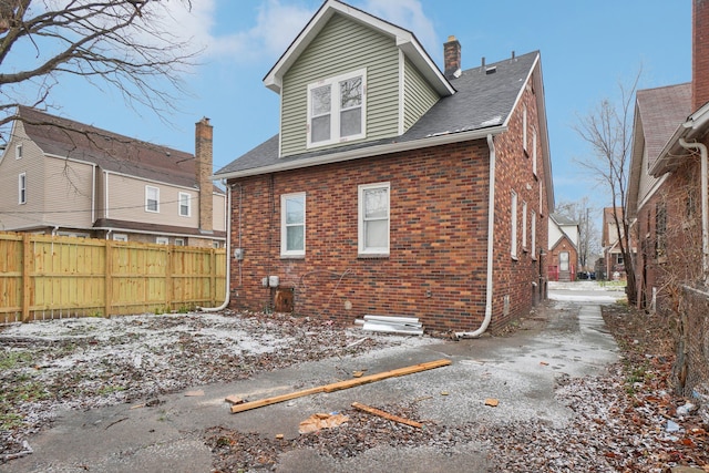 view of snow covered house