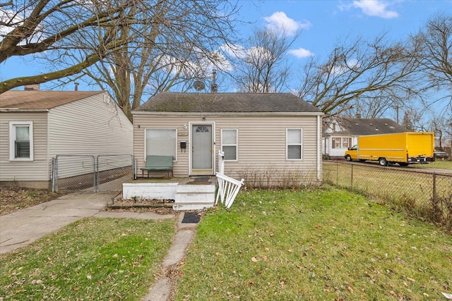 bungalow with a front lawn