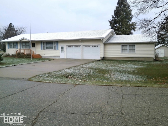 single story home with a garage