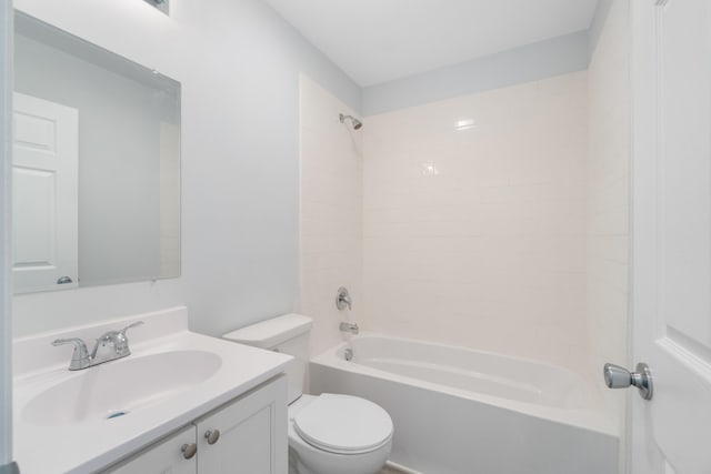 full bath with bathing tub / shower combination, vanity, and toilet