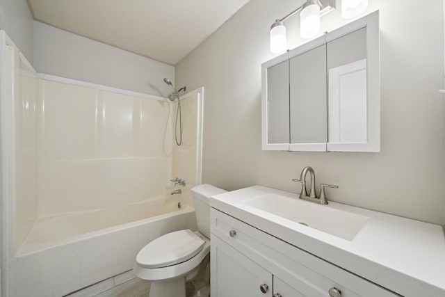 full bathroom with hardwood / wood-style flooring, vanity, shower / bath combination, and toilet