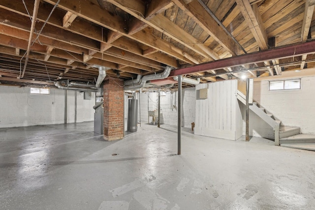 basement featuring water heater