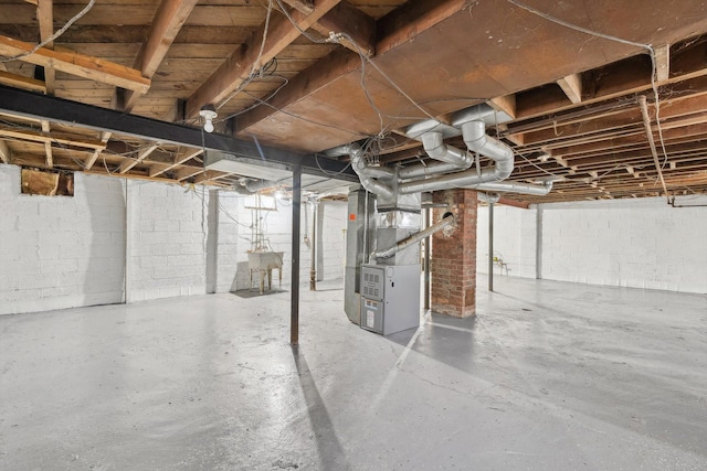 basement featuring heating unit