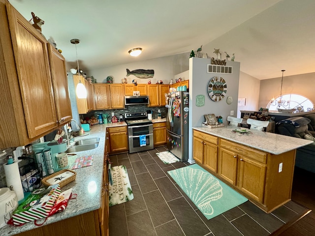 kitchen with decorative backsplash, stainless steel appliances, hanging light fixtures, and lofted ceiling