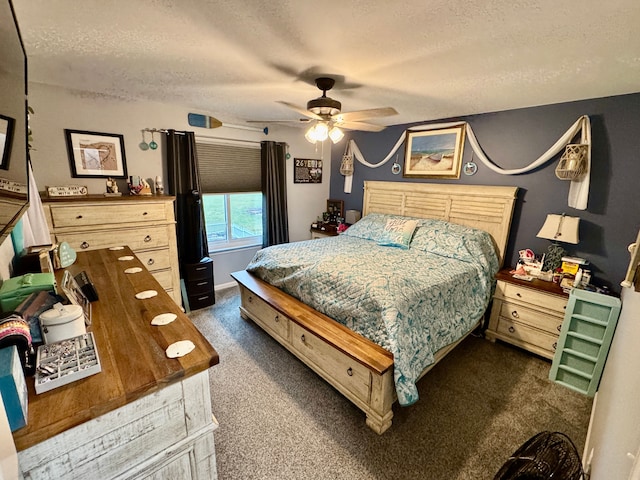 carpeted bedroom with ceiling fan and a textured ceiling